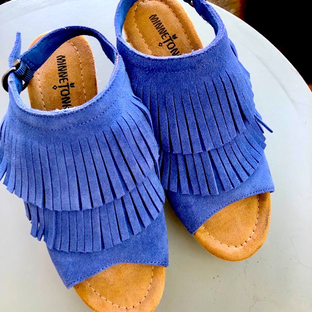 Minnetonka fringe wedge sandals.